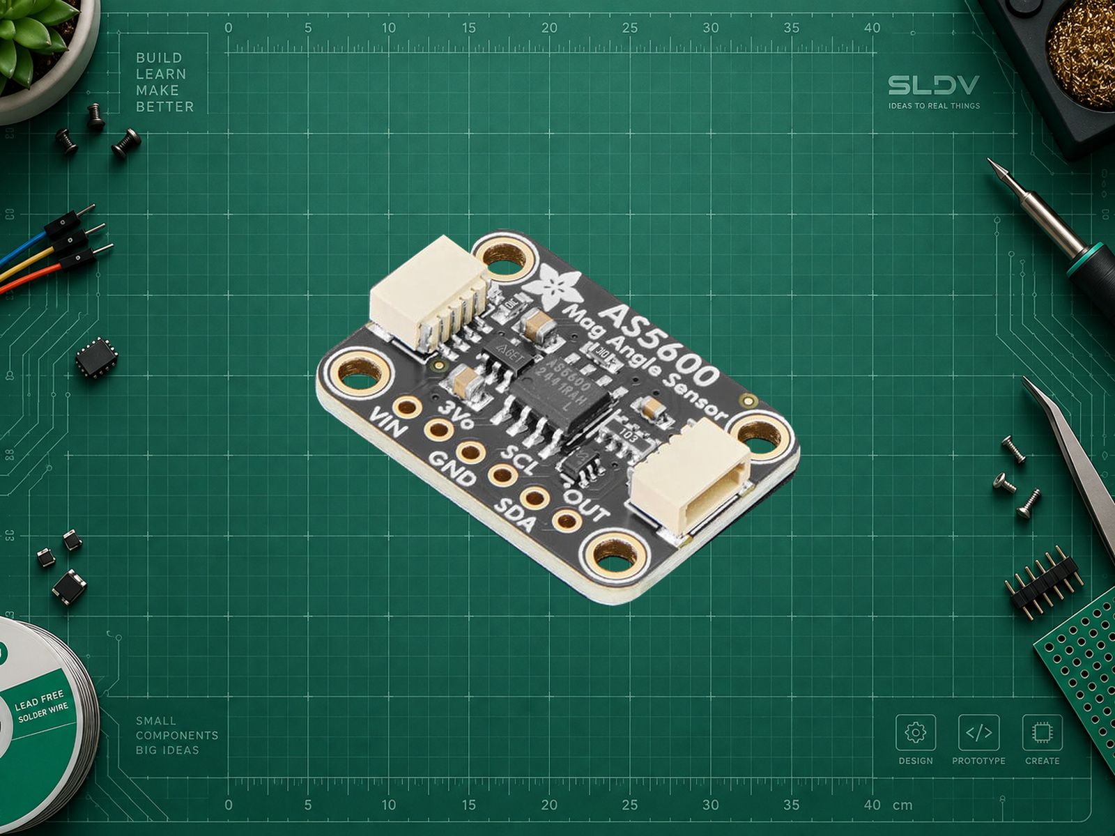 Adafruit AS5600 PID 6357 STEMMA QT на зелёном рабочем коврике